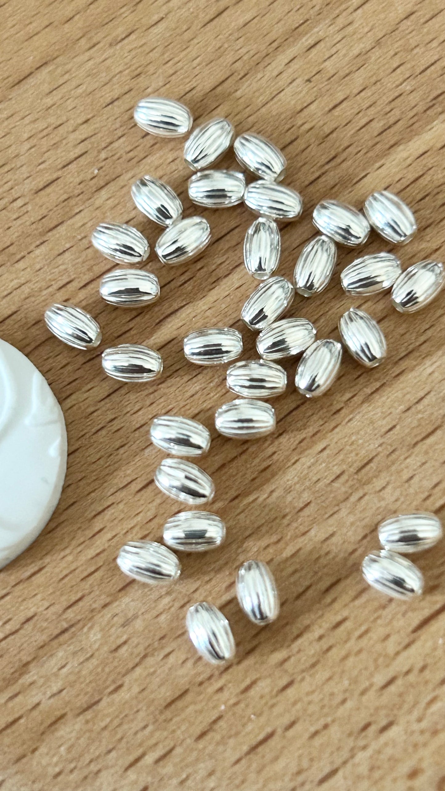10 Perles ovales striées 3x4,6mm trou 1,3mm argent massif 925/1000, intercalaire ovale argent 925