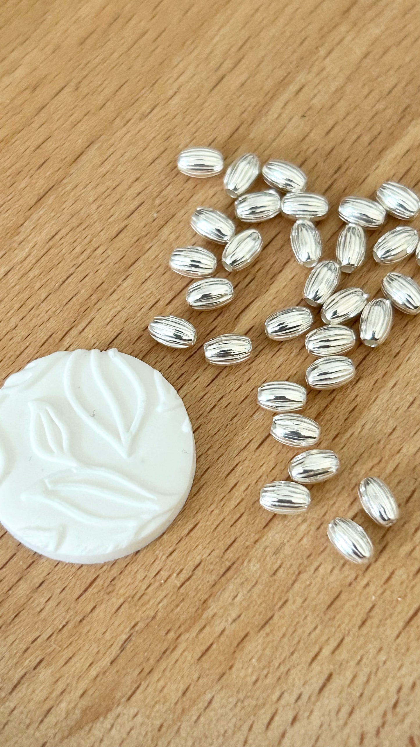10 Perles ovales striées 3x4,6mm trou 1,3mm argent massif 925/1000, intercalaire ovale argent 925
