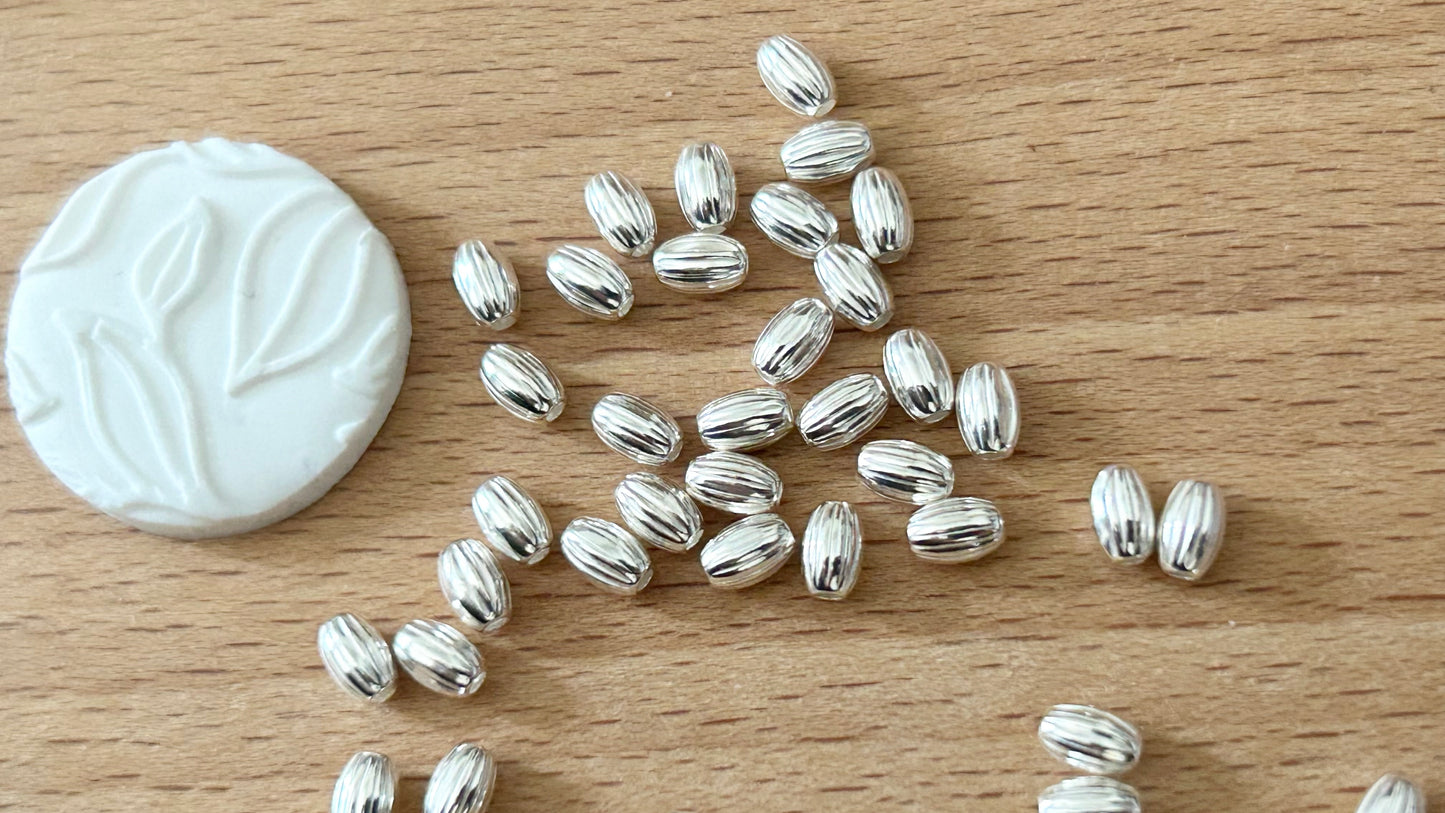 10 Perles ovales striées 3x4,6mm trou 1,3mm argent massif 925/1000, intercalaire ovale argent 925