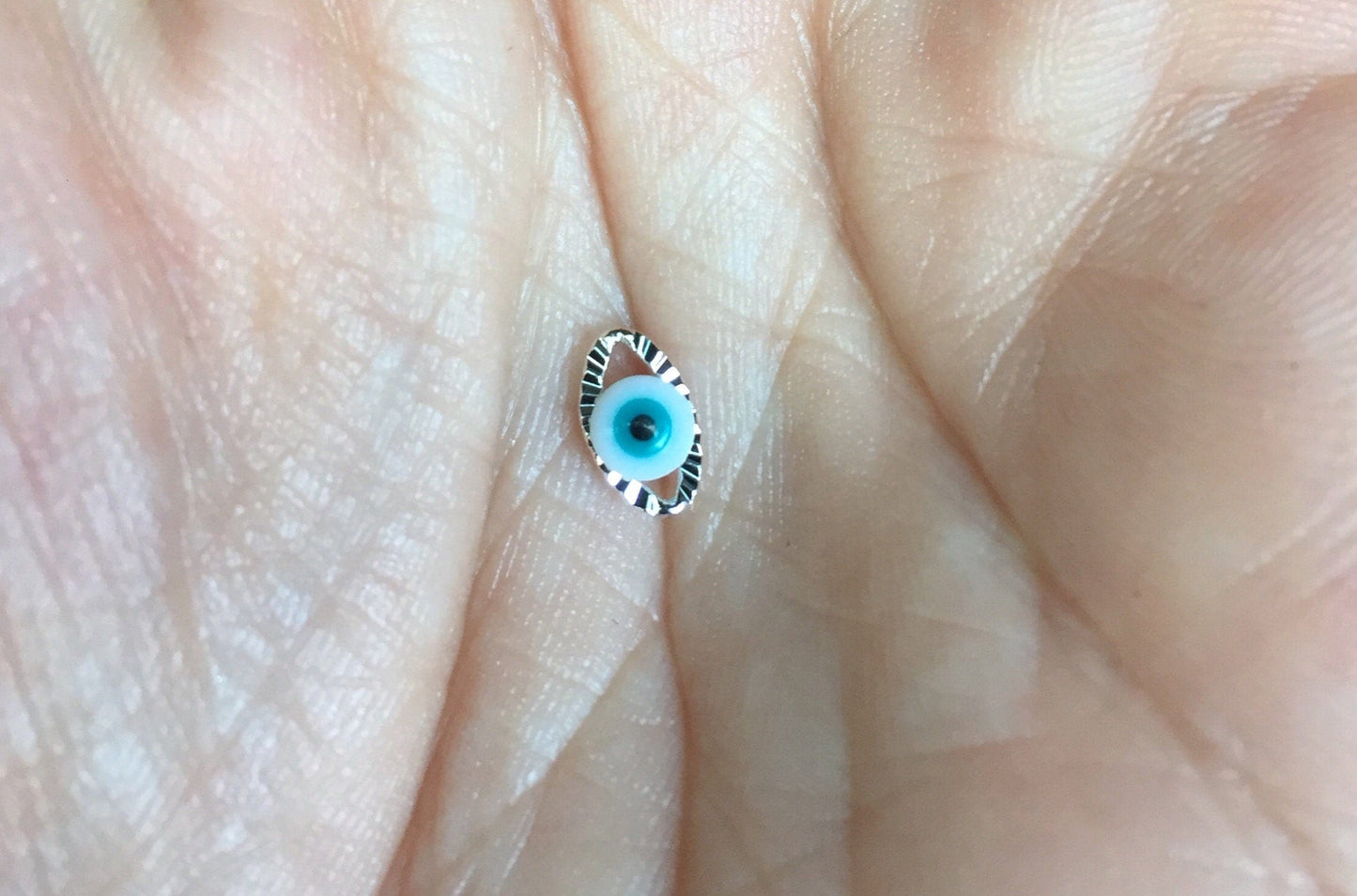 Œil en argent strié double face 8 mm