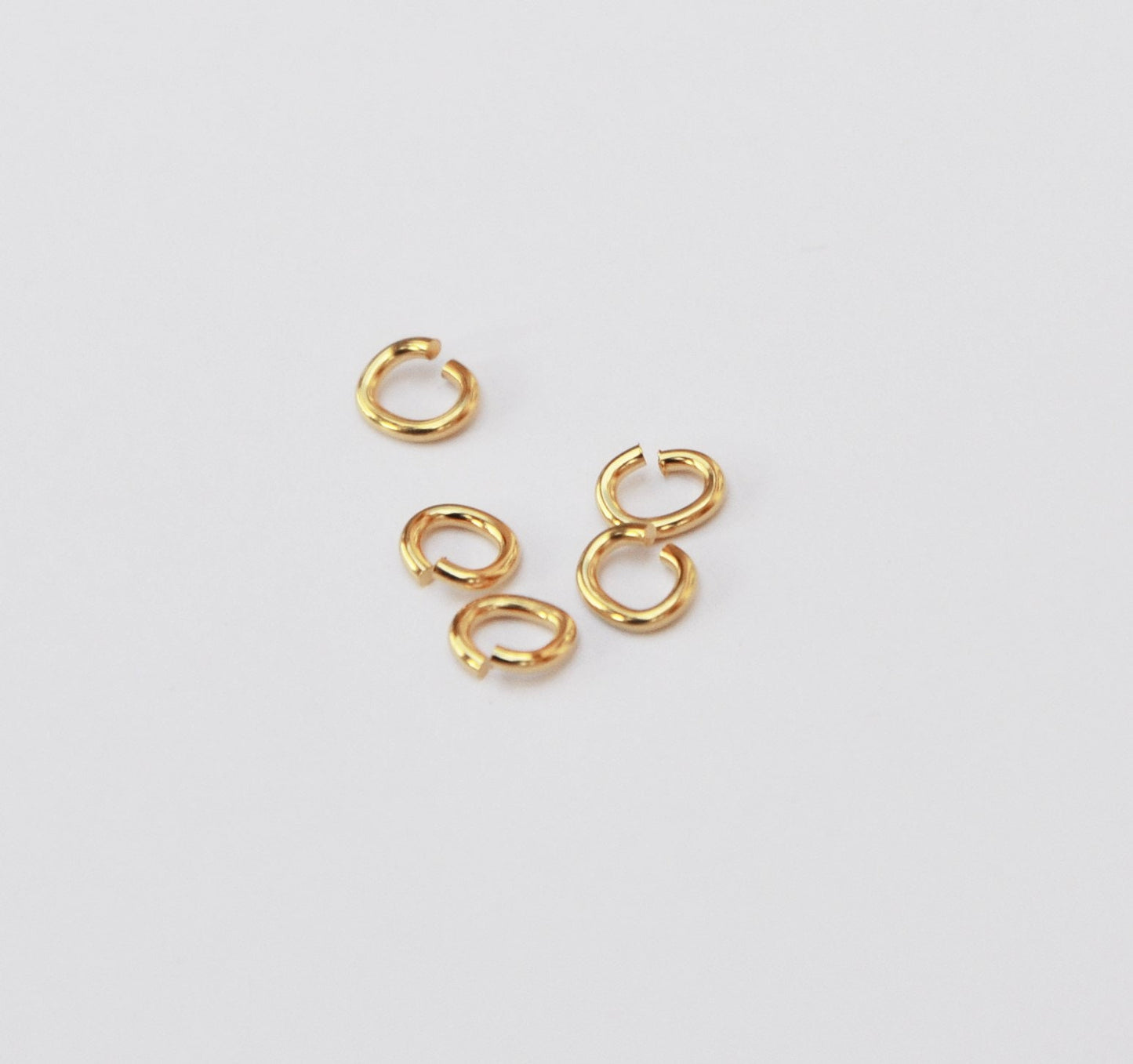 5 Anneaux ovales ouverts plaqué or 24 carats
