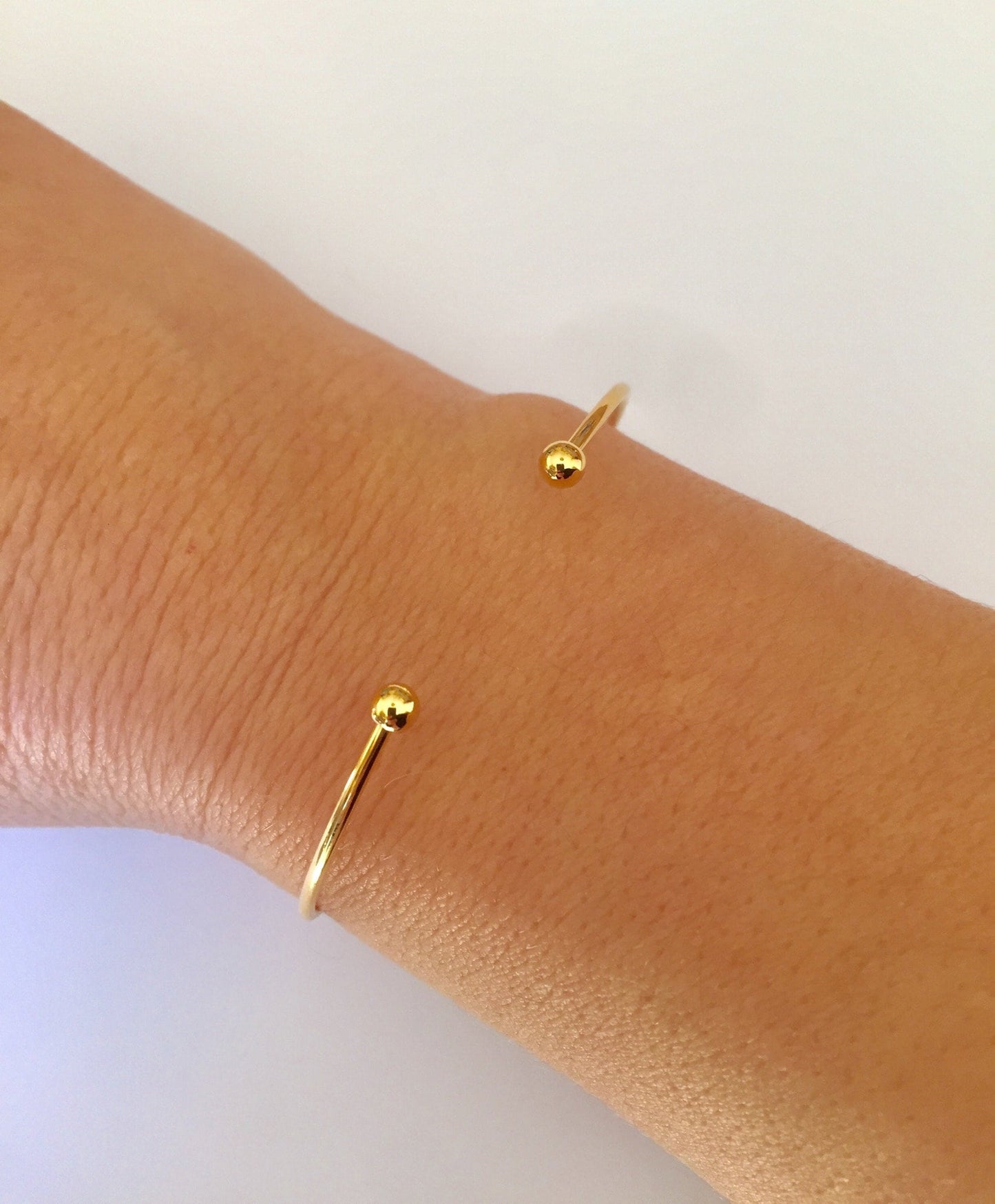Jonc 2 boules 60 mm , bracelet cercle rigide plaqué or 24K