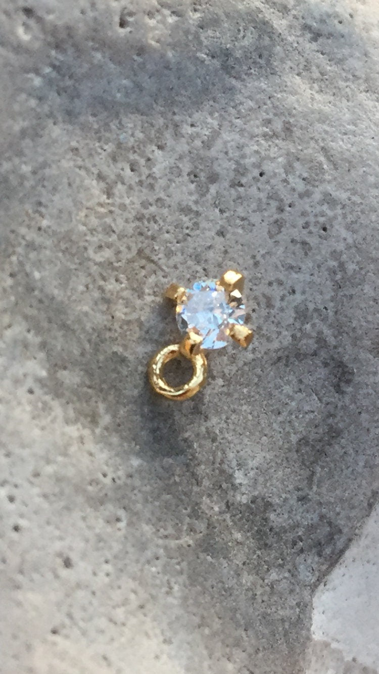 Diamant serti sur griffes strass 4 mm plaqué or zirconium