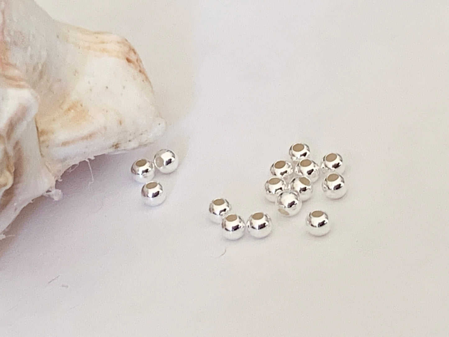 Par lot de 10 Perles lisses 4 mm trou 1,5mm argent massif 925/1000