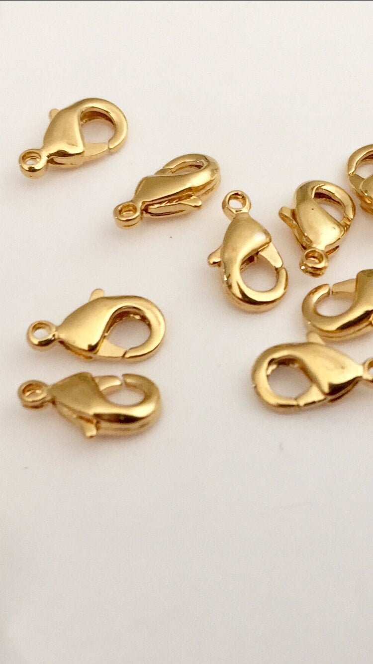 Fermoirs Mousqueton 8 mm plaqué or 24 carats 3 microns sur laiton