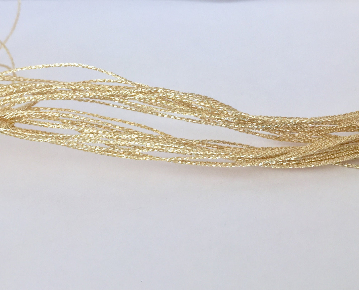 5 mètres fil polyester 0,4mm Or